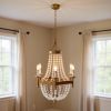 Gold And White Candle Style Six Light Metal and Frosted Glass Chandelier